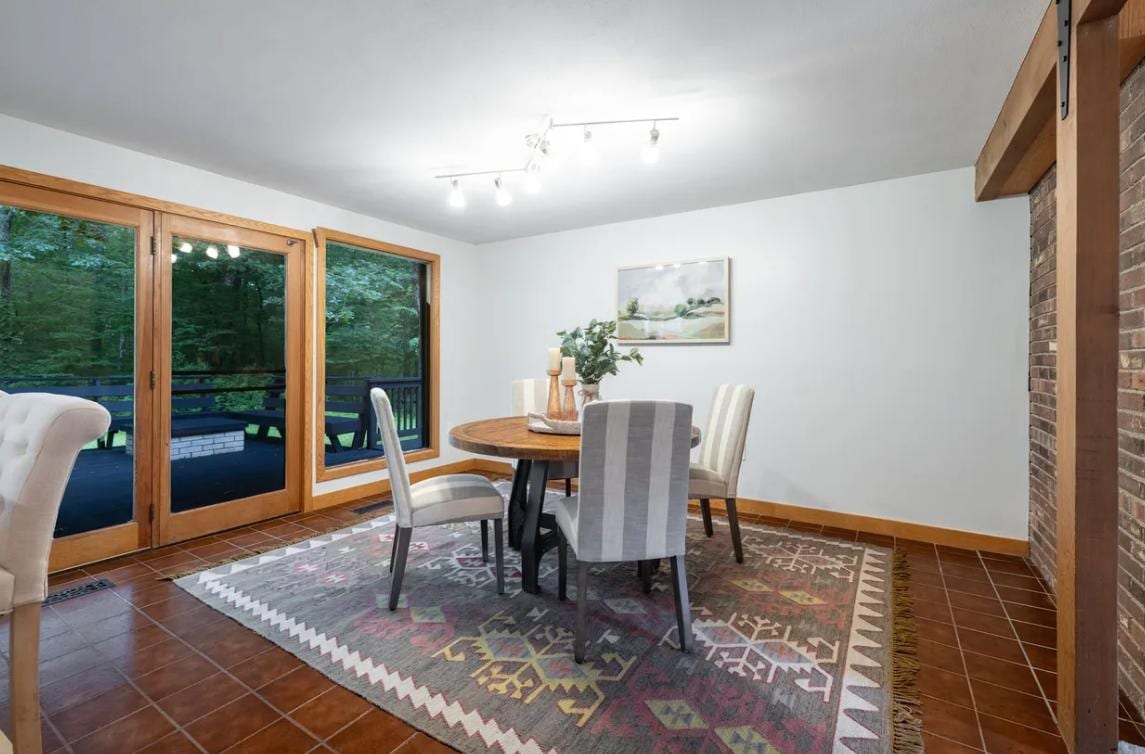 Dining room with newly installed track lighting