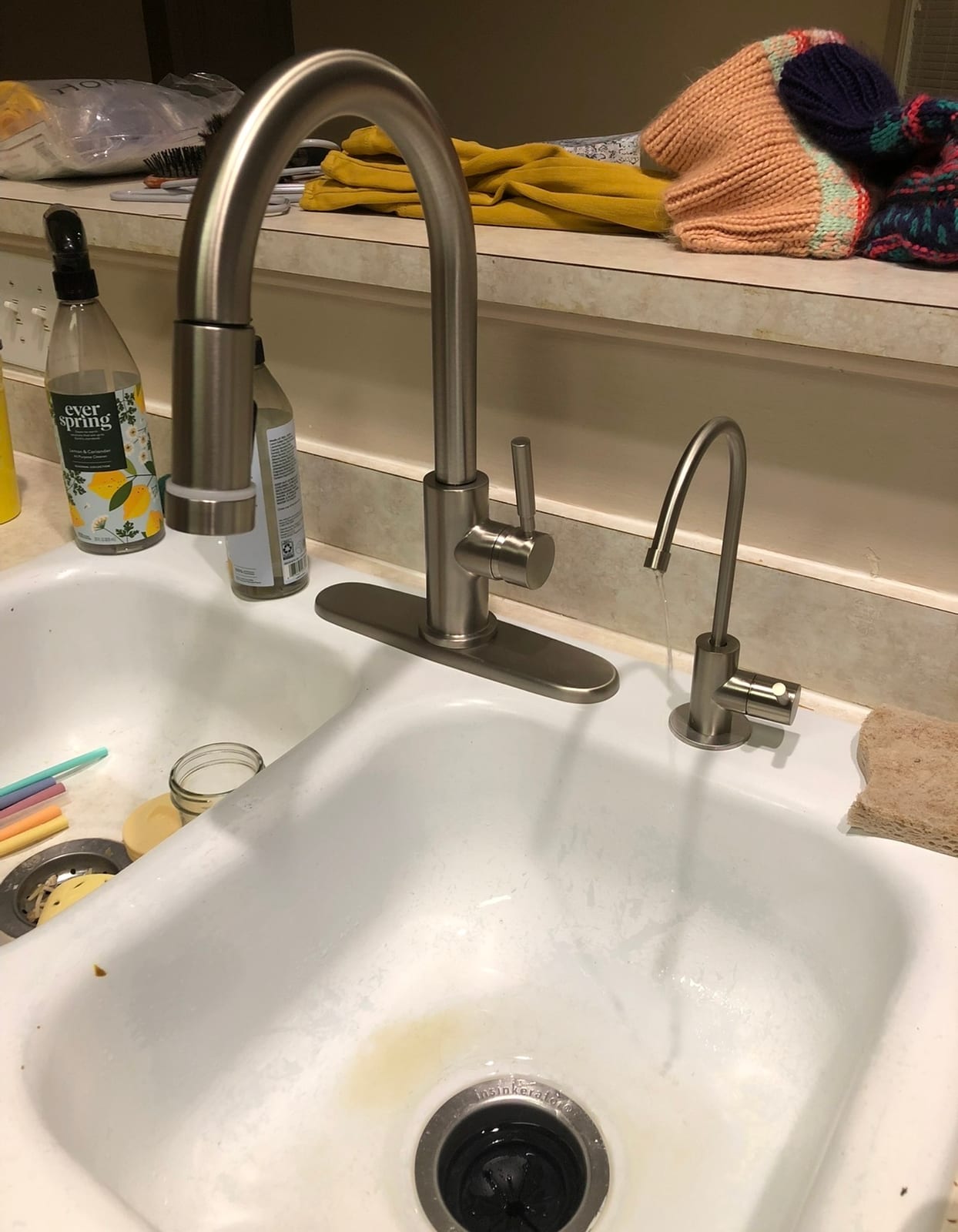 Old white porcelain kitchen sink before replacement